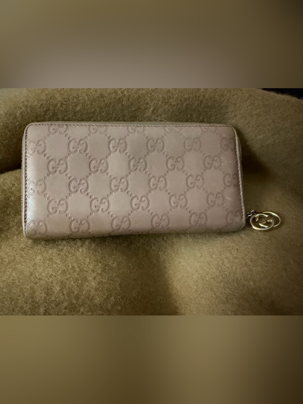 Gucci Blush/Taupe GG Embossed Zippy Leather Wallet.
